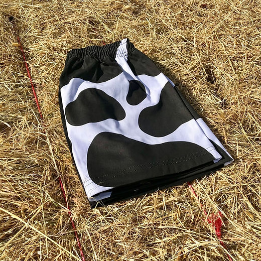 Black Cow Print Harlequin Shorts